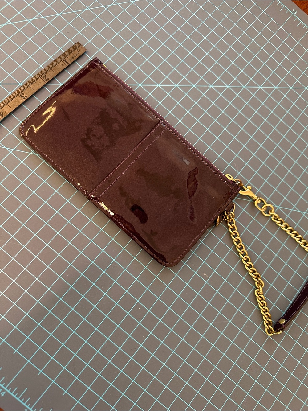 Coach Patent Wristlet in deep purple with Gold Hardware - Picture 2 of 3